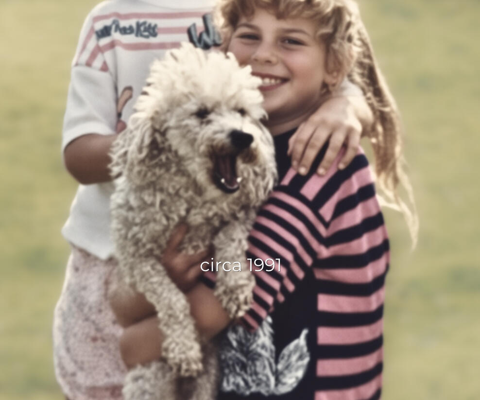 Tina as a child holding a poodle – lifelong passion for pets and animal care.